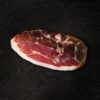 JAMBON NOIR DE BIGORRE DÉSOSSÉ EN DEMI, DÉCOUENNÉ, DÉGRAISSÉ, LÉGÈREMENT PELÉ (AFFINAGE 20 MOIS)